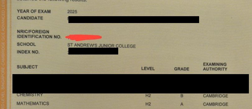 Cropped A-Level result slip showing subject grades, personal details redacted